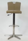 An Aktuell aluminium and leather adjustable bar stool,