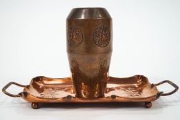 An Art Nouveau copper two handled tray, overall 33cm, together with a copper vase,