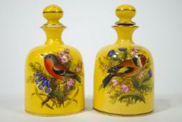 A pair of 19th century Worcester porcelain yellow ground scent bottles,