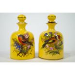 A pair of 19th century Worcester porcelain yellow ground scent bottles,