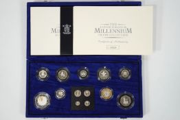 A boxed and cased Royal Mint United Kingdom Millennium silver coin collection