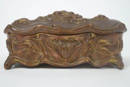 An Art Nouveau gilt metal box, of contrived shape,