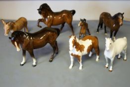 Six Beswick horses and a donkey