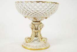 A 19th century Continental porcelain table centre piece, decorated in gilt,