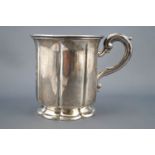 A silver small baluster mug, of George III design and another