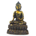 A gilt bronze figure of a Buddha,