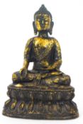 A gilt bronze figure of a Buddha,