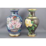 A cloisonne vase, decorated with flower heads on a black ground, 21cm high,