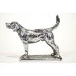 A chrome finished car mascot in the form of a fox hound,