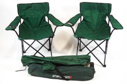 A group of four folding fishing/sports chairs