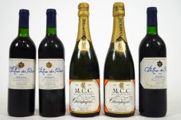 Two bottles of M.C.C. bi-centenary Champagne