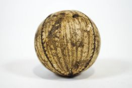 A stitched leather fives ball,