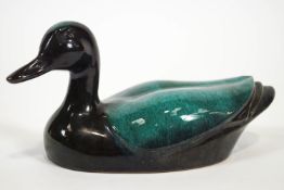 A Poole pottery streaked turquoise glazed mallard duck figure 12cm high x 27cm wide