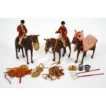 A group of three hand crafted Hunter horses, in brown leather,