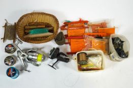 A Storm 7000 aluminium fishing reel with other reels,