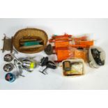 A Storm 7000 aluminium fishing reel with other reels,