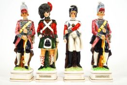 A group of four bone china military figure decanters with corked stopper removable heads,