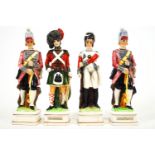 A group of four bone china military figure decanters with corked stopper removable heads,