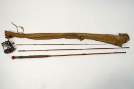 An Armstrong three piece split cane rod in a Hardy bag...