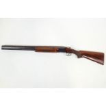 A 12 gauge 'Winchester' over and under Shotgun marked Serial No.