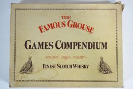 A leather cased Waddingtons Famous Grouse Games compendium (limited edition)