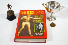 A silver two handled trophy presented to Boxer Ted Kid Lewis 1933, together with a boxing trophy,