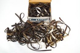 A quantity of bridles and other horse tack