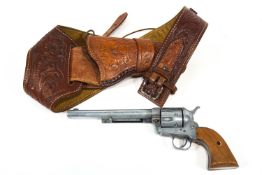 A replica Model Single Action Army 45 pistol,