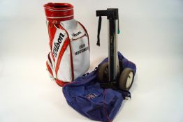 A Wilson Golf tour bag marked 'Colin Montgomery',