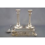 A pair of silver George III cast and pierced shell end sugar tongs, 13cm long,