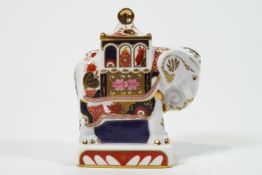 A Worcester elephant candle snuffer, decorated in the Imari palette,