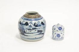 A Chinese porcelain ginger jar, painted in under glaze blue with a landscape,