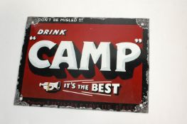 An enamel sign for Camp coffee 'Drink Camp it's the Best',