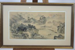 A pair of Chinese silk paintings, of tree set mountain landscapes,