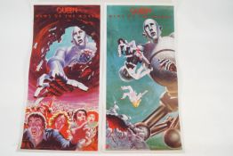 A pair of 'Queen News of the World' posters, stamped archive copy of the World Posters,
