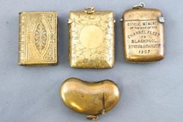 A group of seven unusual brass and base metal vesta cases to include examples with enamel armorials,