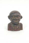 A cast iron money box, in the form of a negro,