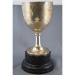 A silver Chalice form trophy, with ovoid bowl on plain stem, raised on a flared foot,