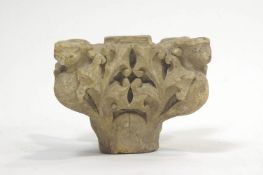 A carved stone column capital, believed to be 15th century,