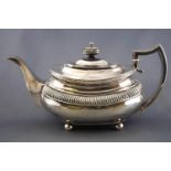 A silver large form rounded rectangular teapot,