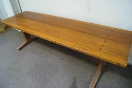 A refectory table and two matching bench seats by Geoffrey Juniper,