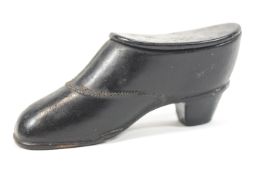 A snuff box in the form of a shoe,