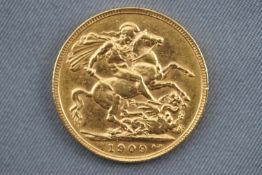 An Edward VII full sovereign coin, dated 1909.