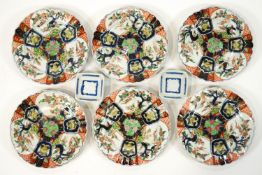 A group of Imari porcelain plates and five dishes