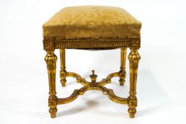 A 19th century gilt piano stool, in the French style,