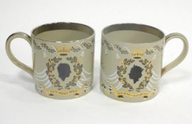 A pair of Wedgwood commemorative mugs, designed by RIchard Guyatt, printed marks,