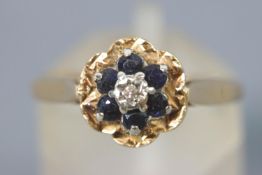 A collection of two yellow metal rings to include: A yellow/white three stone diamond ring,