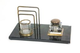 An Art Deco style glass and brass desk set,