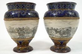 A pair of Doulton Stoneware vases decorated by Hannah Barlow,