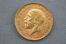 A George V full sovereign coin, dated 1929.